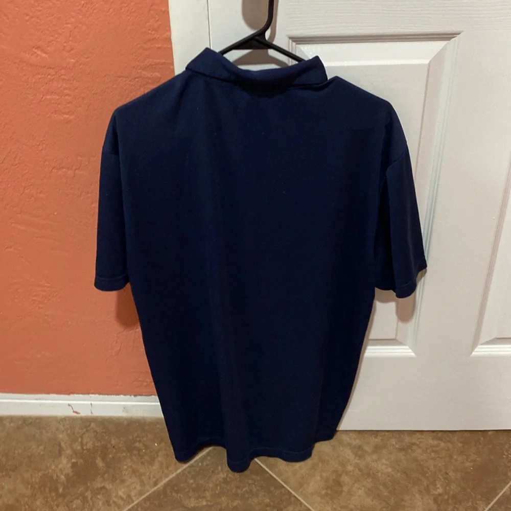 Nike men’s large dri-fit polo. Great condition.  No flaws.  Navy color - Picture 3 of 6